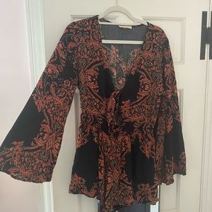 Black and orange printed romper